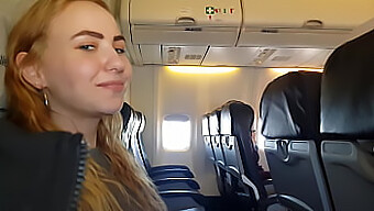 Natural Beauty Gives A Public Handjob On An Airplane