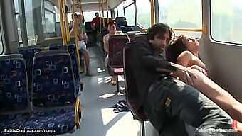 A Young European Woman Engages In Sexual Activity On A City Bus While Practicing Bdsm And Bondage